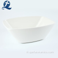 Bol de salade en céramique blanche pour ustensiles de cuisine en bambou